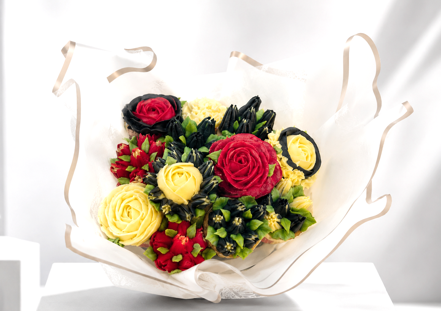 Red and Cream cupcake bouquet on table, fresh cupcake gift UAE