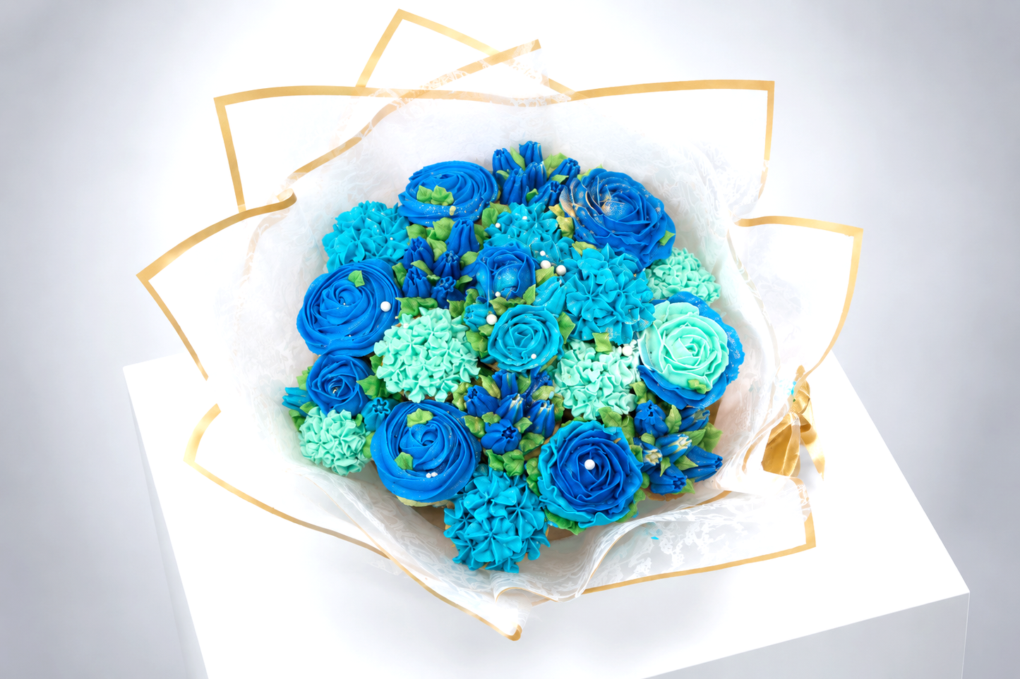Dark Blue cupcake bouquet on table, fresh cupcake gift UAE