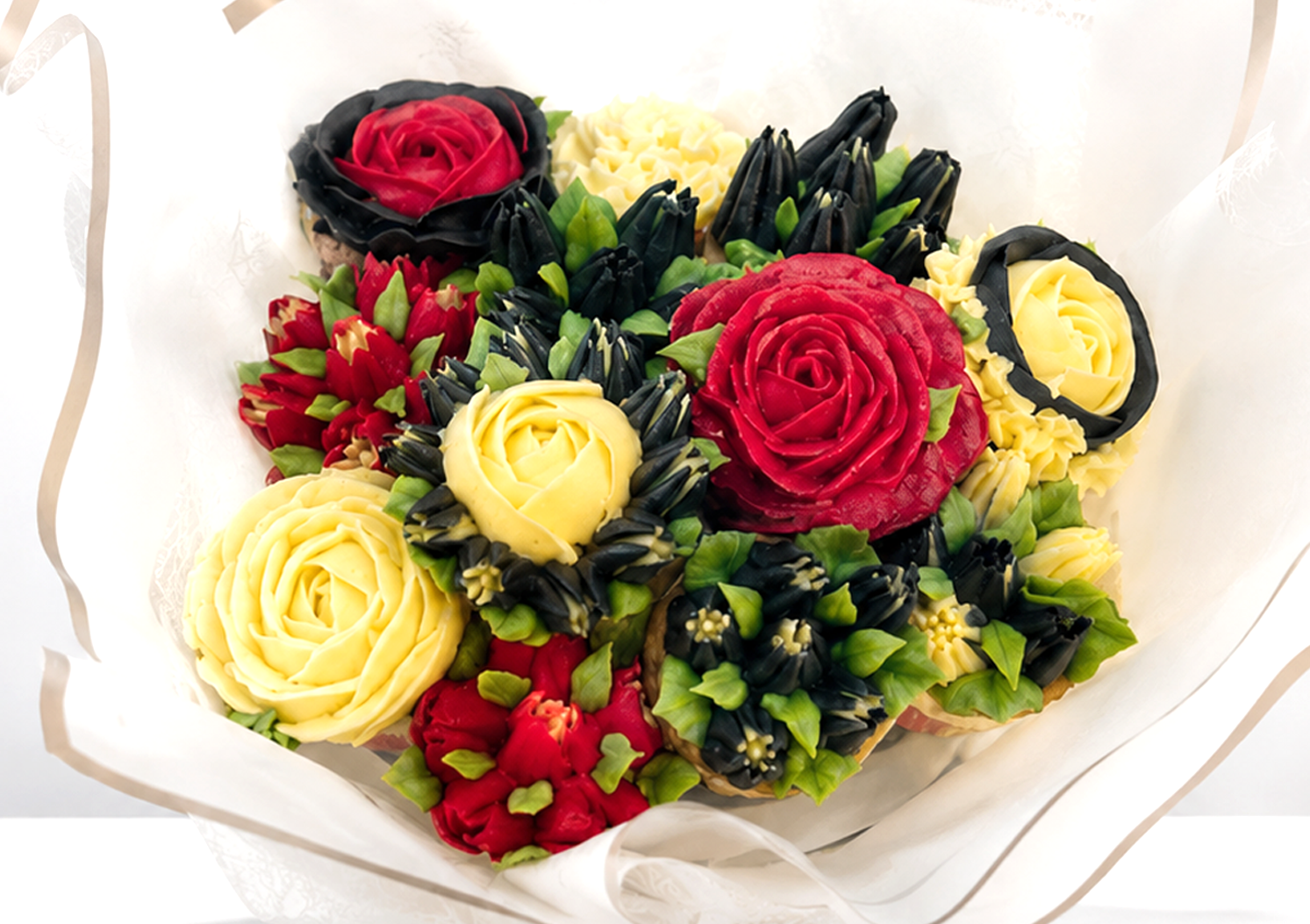 Close-up of Red and Cream cupcake bouquet, handmade cupcakes UAE