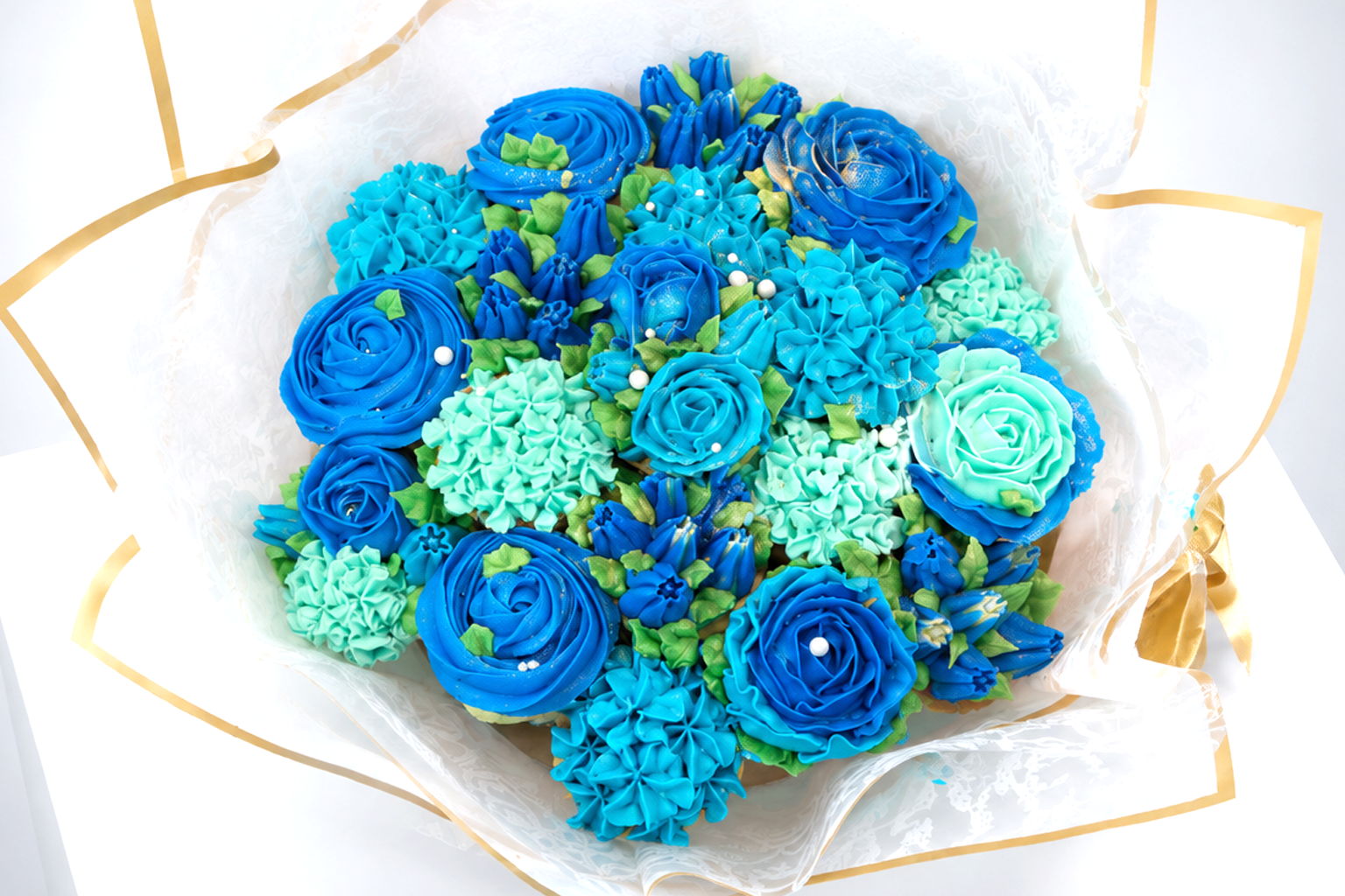 Close-up of Dark Blue cupcake bouquet, handmade cupcakes UAE