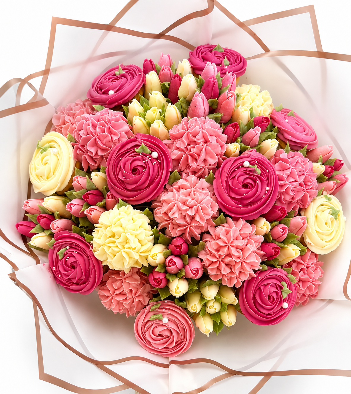 Top view of Blush Meadow pink and coral cupcake bouquet, handmade cupcakes UAE