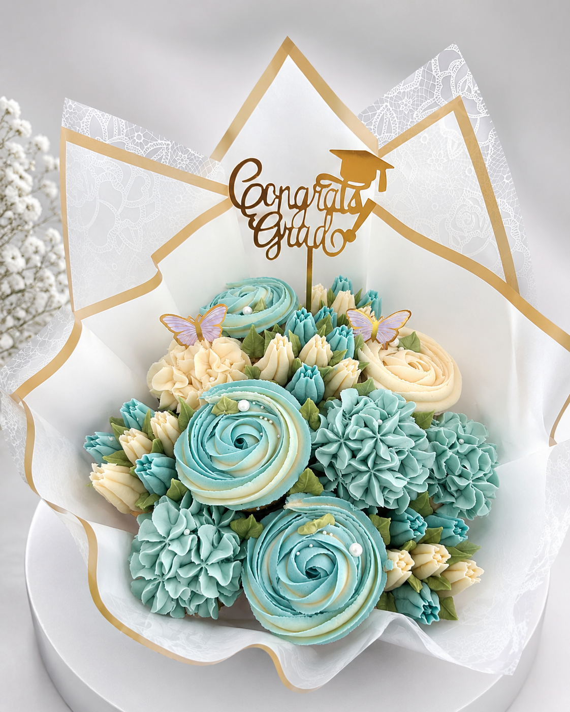 Sky Blue cupcake bouquet on table, fresh cupcake gift UAE
