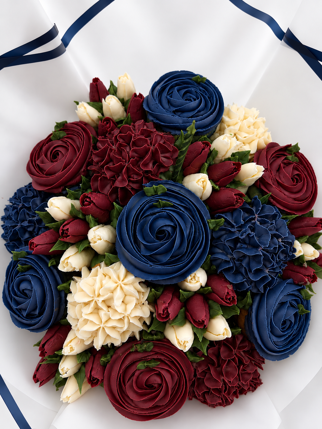 Midnight Rouge cupcake bouquet, red and navy handmade cupcakes UAE